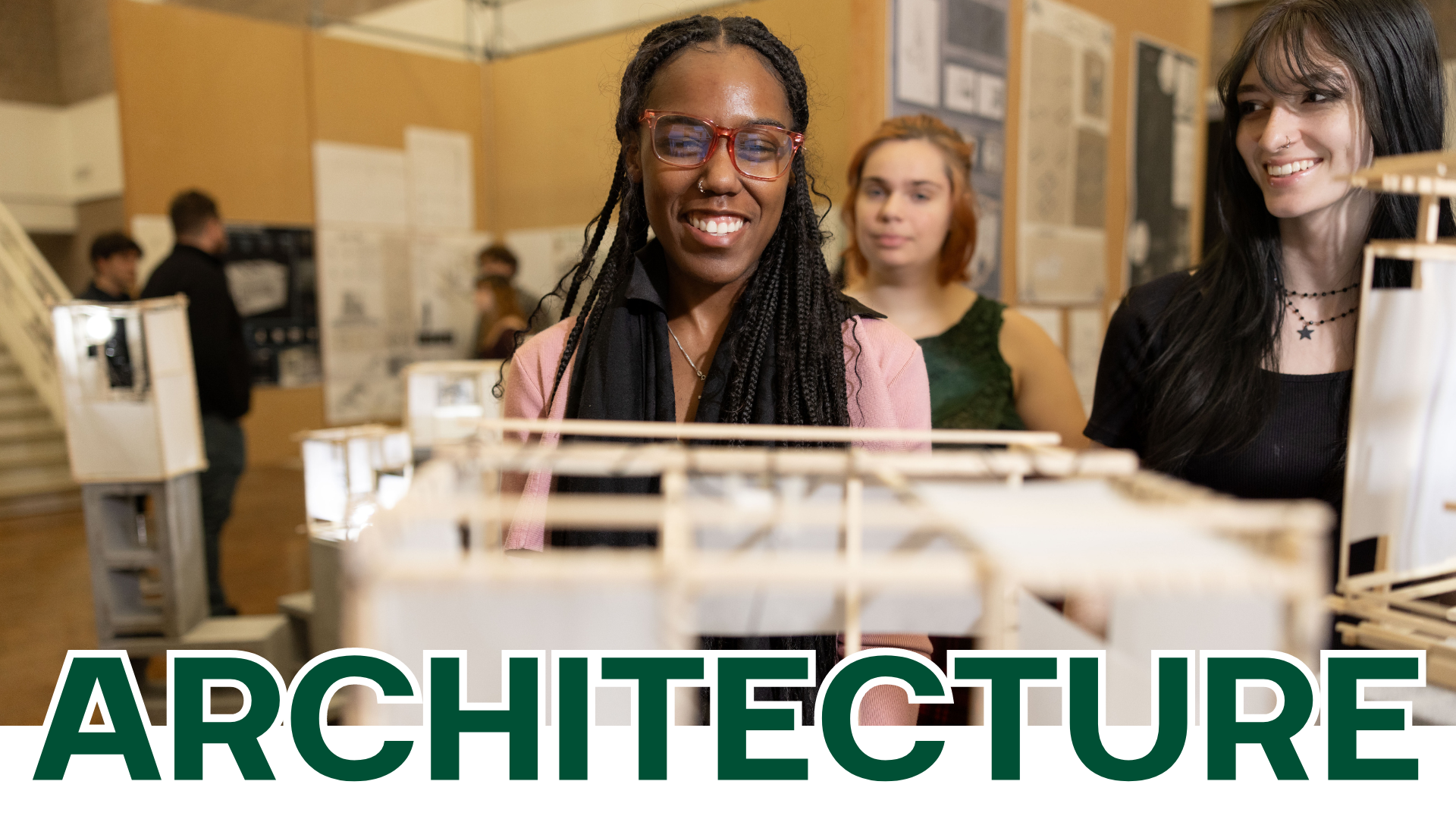 Banner photo of a young woman standing in front of her final review project. Title text reads: Architecture