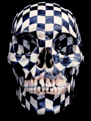 skull painted with black checks