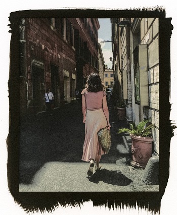 image from Rome, woman walking down street