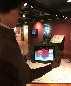 Lee in exhibition with map