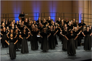women singing in black dresses