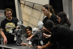 students with Caligari puppets