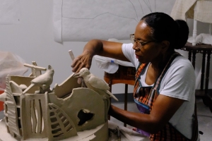 Lydia Thompson working on a sculpture