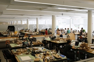 students in architecture school working at desks.