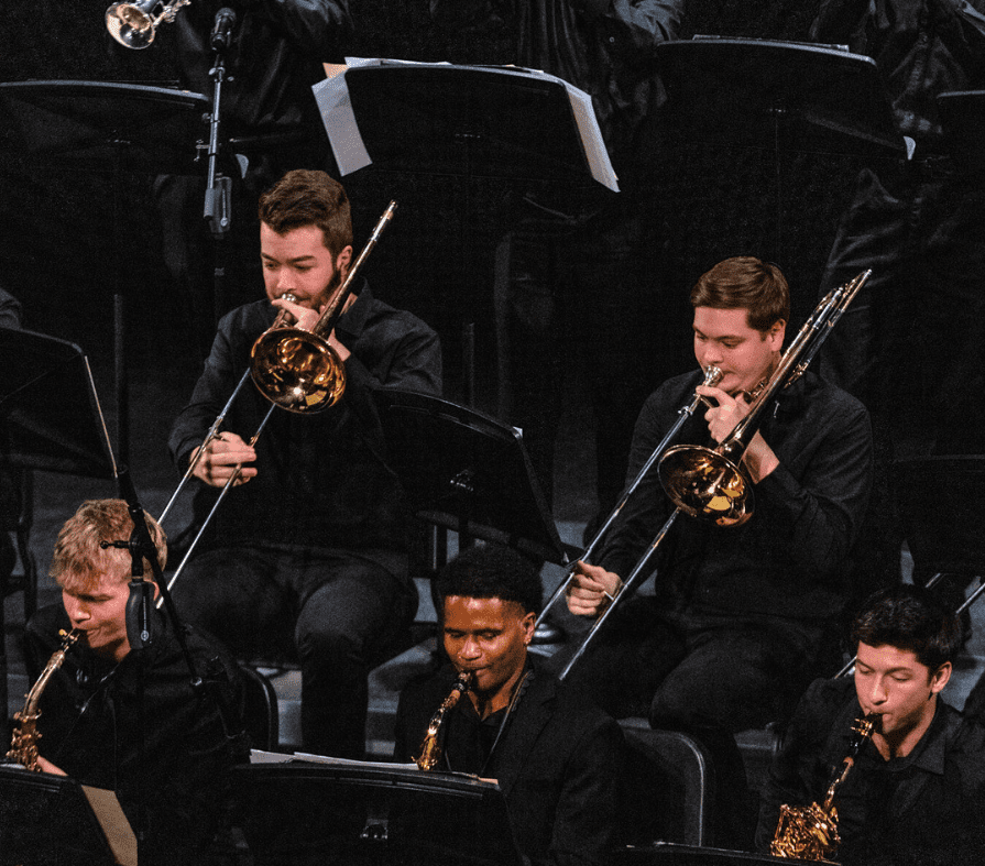 Jazz students on stage playing their instruments