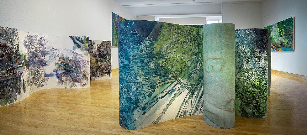 Maja's large sculptural paintings in a gallery
