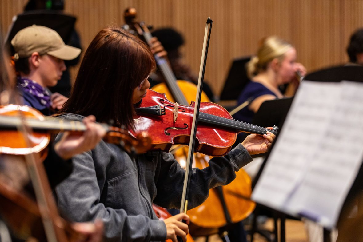 high school students playing in orchestra
