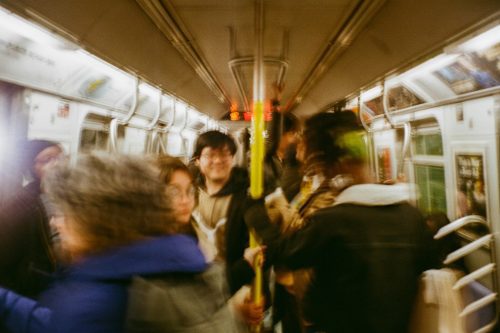 student blurry on a subway