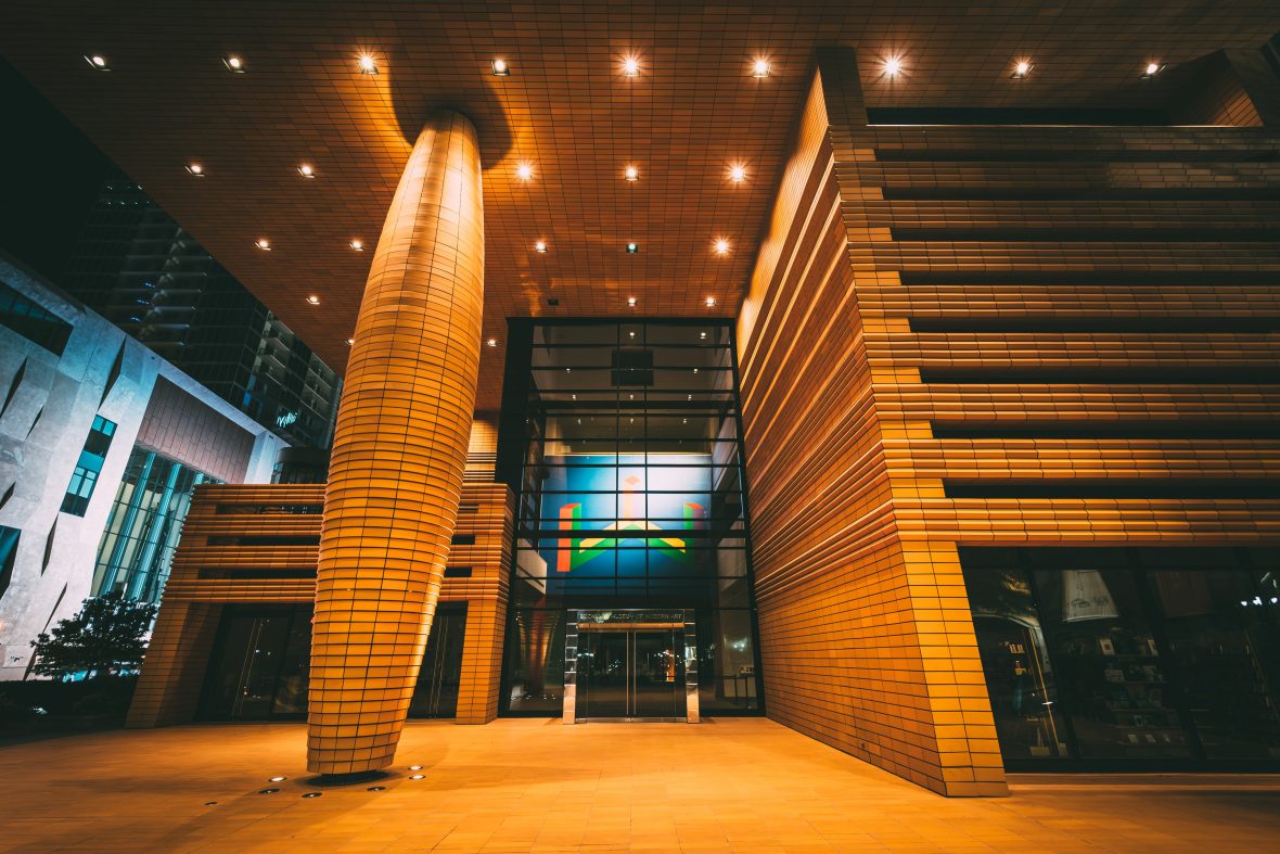 The exterior of the Bechtler Museum of Modern Art at night