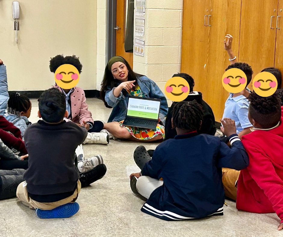 Mckeila Ortiz with elementary students.