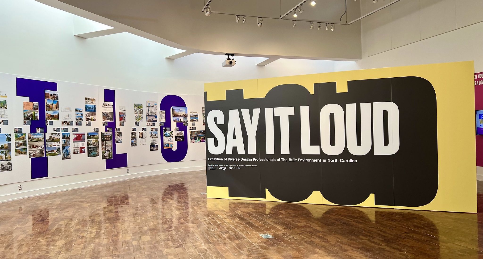 "say it loud" signage in a gallery