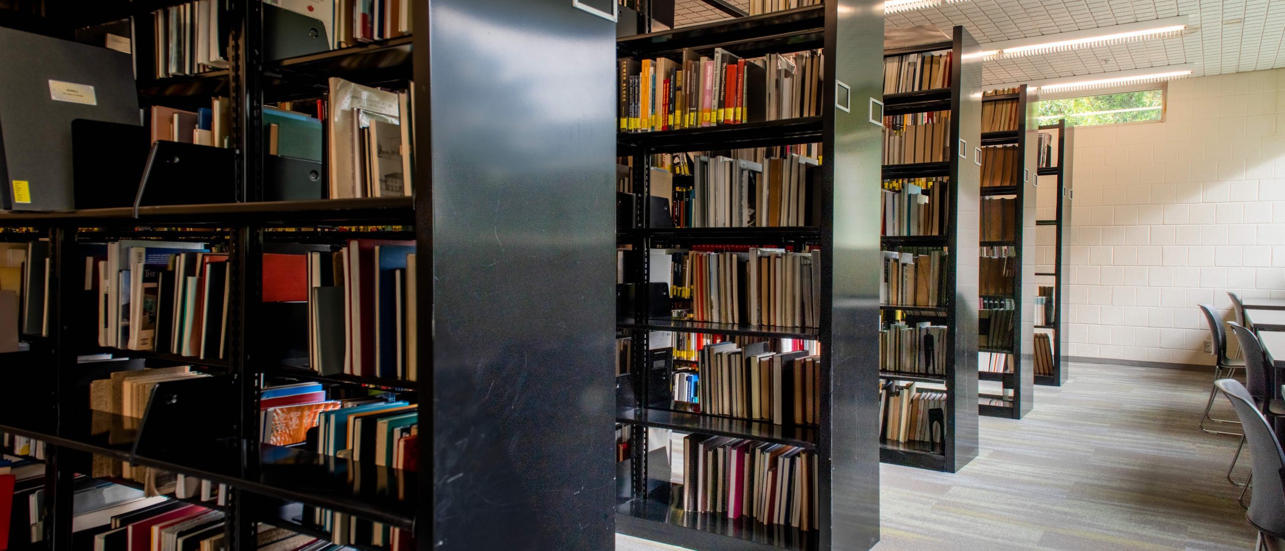 close up of books on shelves in library 