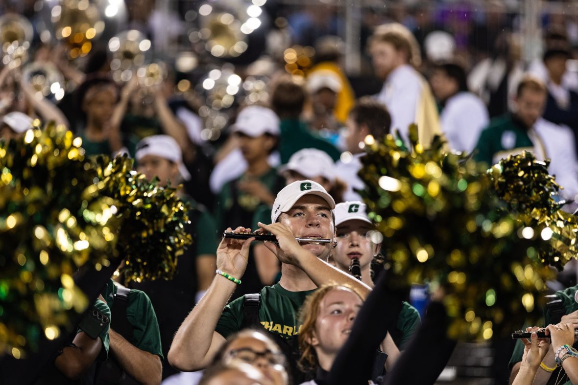 Basketball band students at night