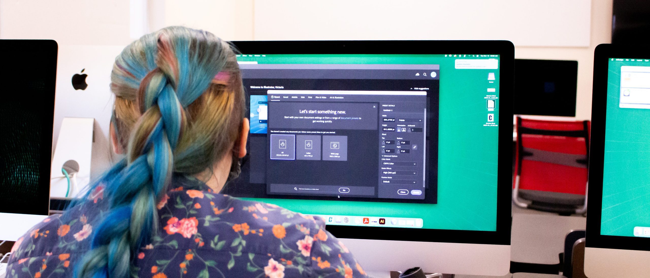 One student opening an Adobe file
