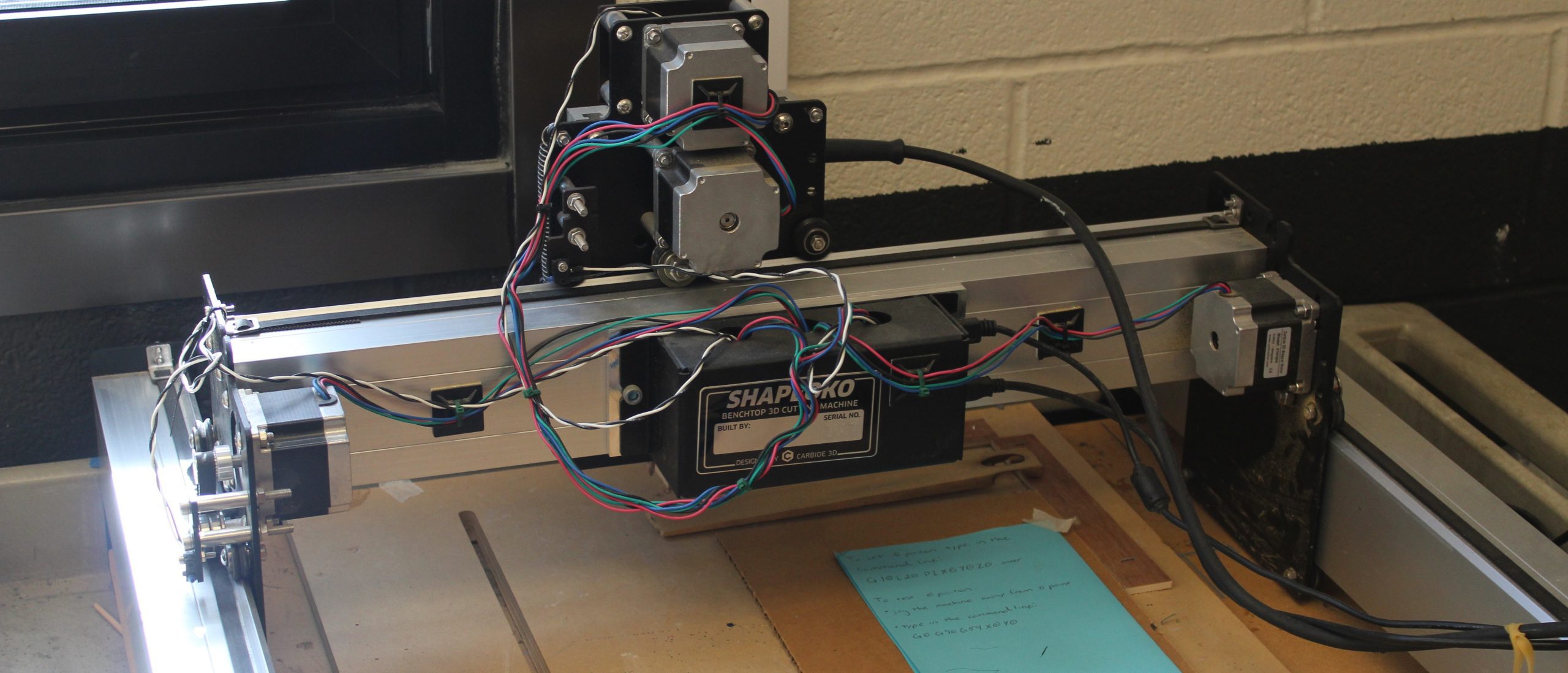 Close-up view of a 3-D cutting machine with wires