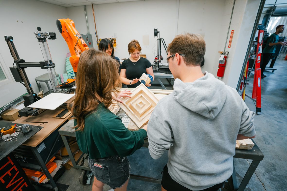 students working with recyclable material in a lab