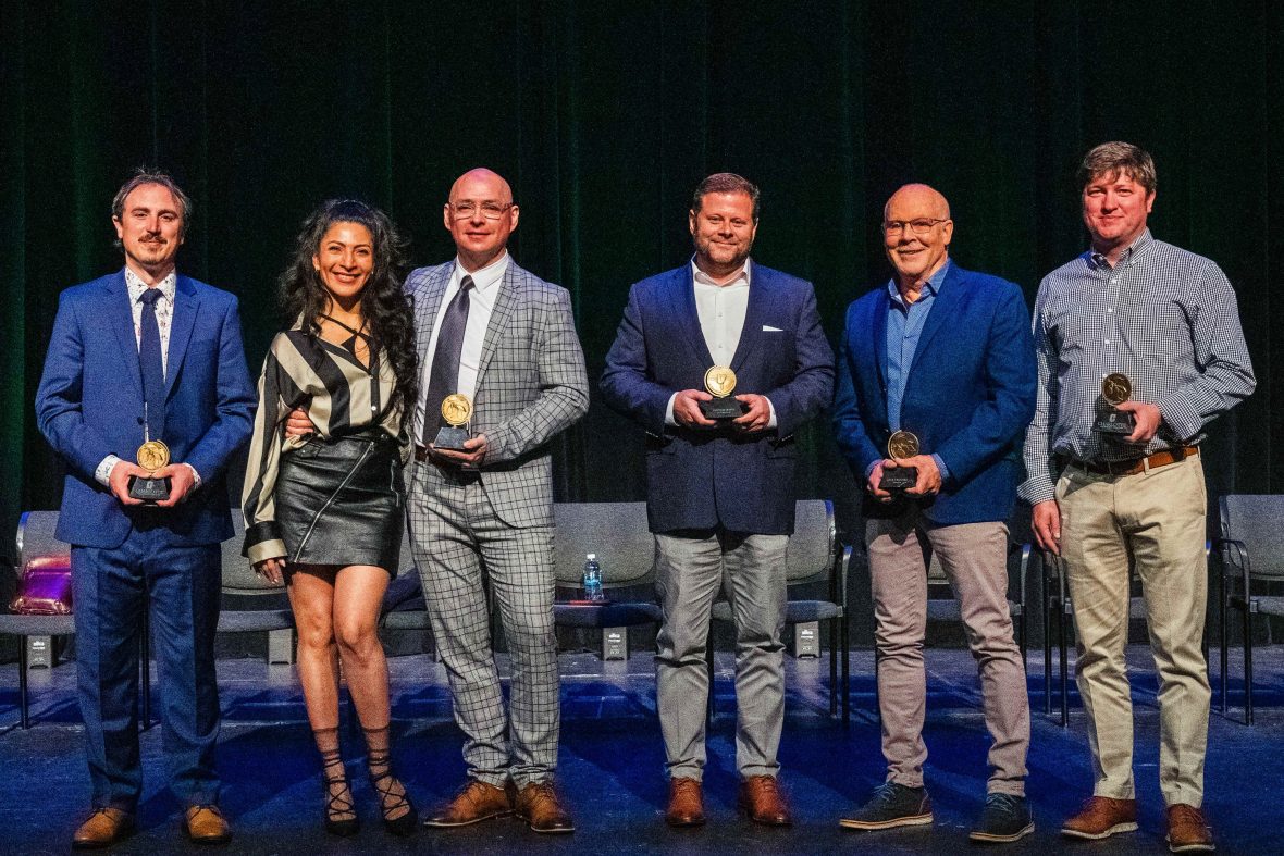 2023 alumni on stage, six of people