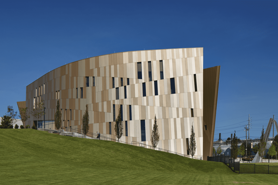 Architecture building on green grass and a blue sky