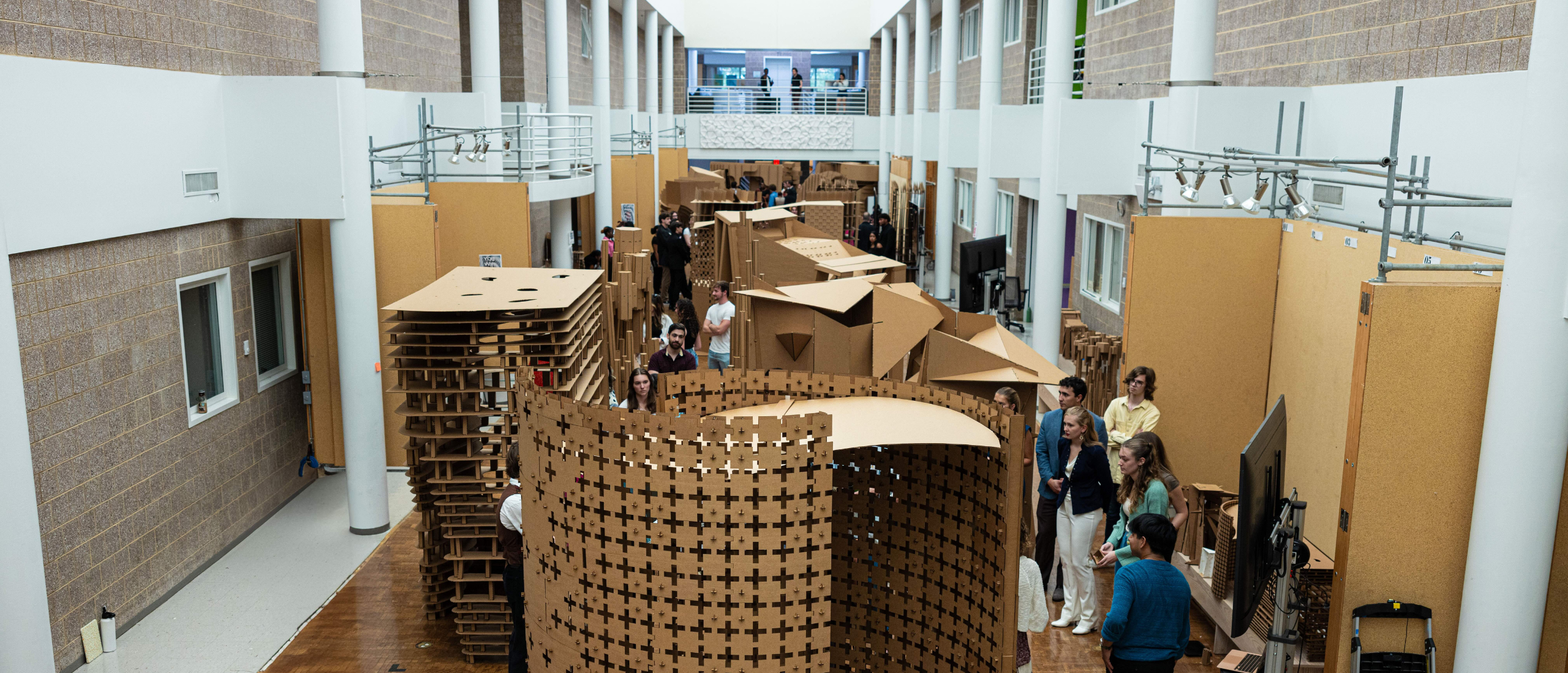 cardboard structures filling the salon