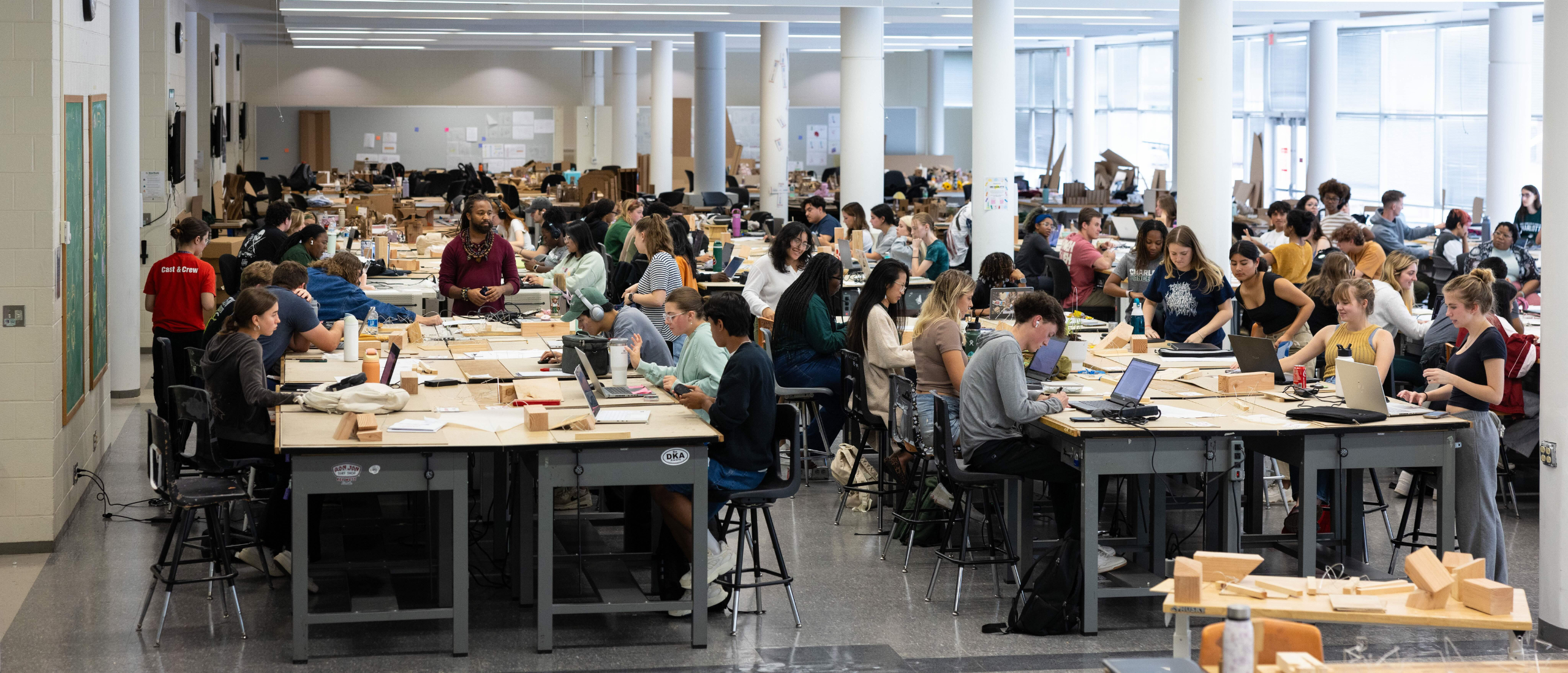students working in the studios, full of projects and students