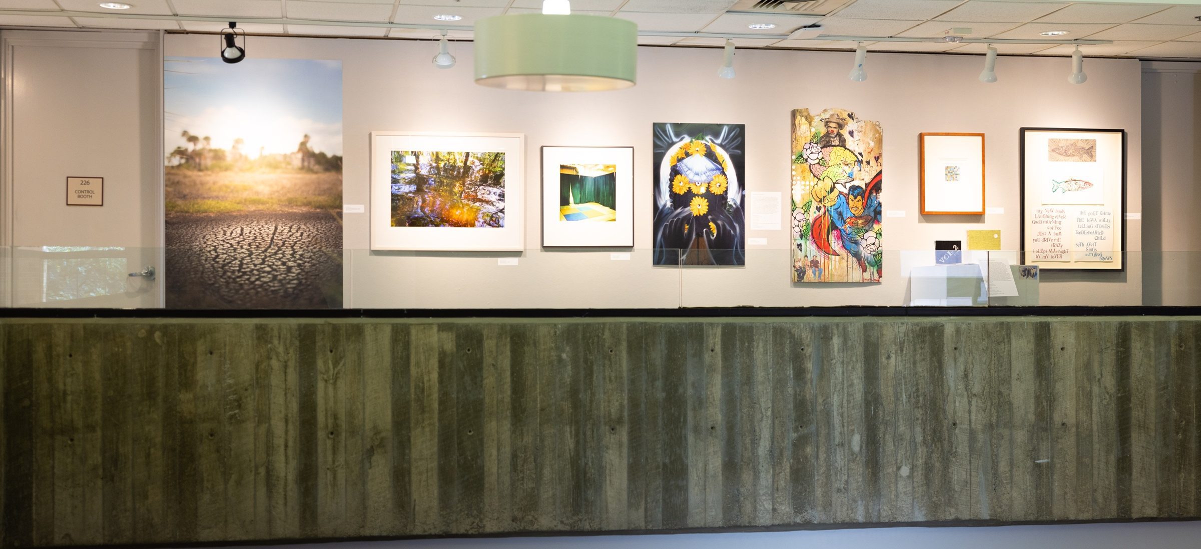 upper hallway in Rowe Arts with 2D art on wall