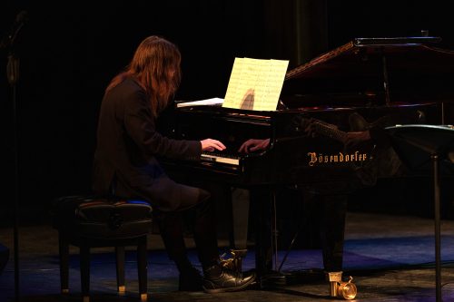 Pianist performing on stage