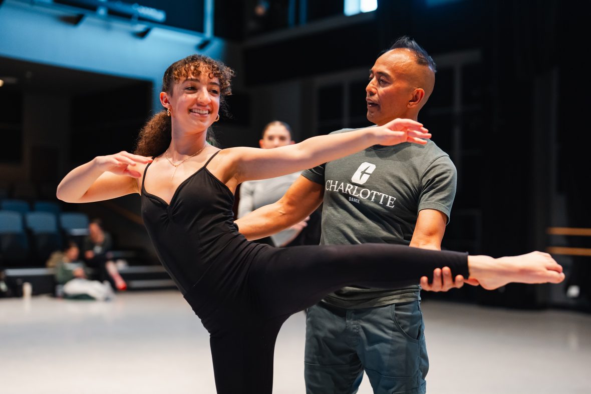 Teaching working dance student in a side attitude