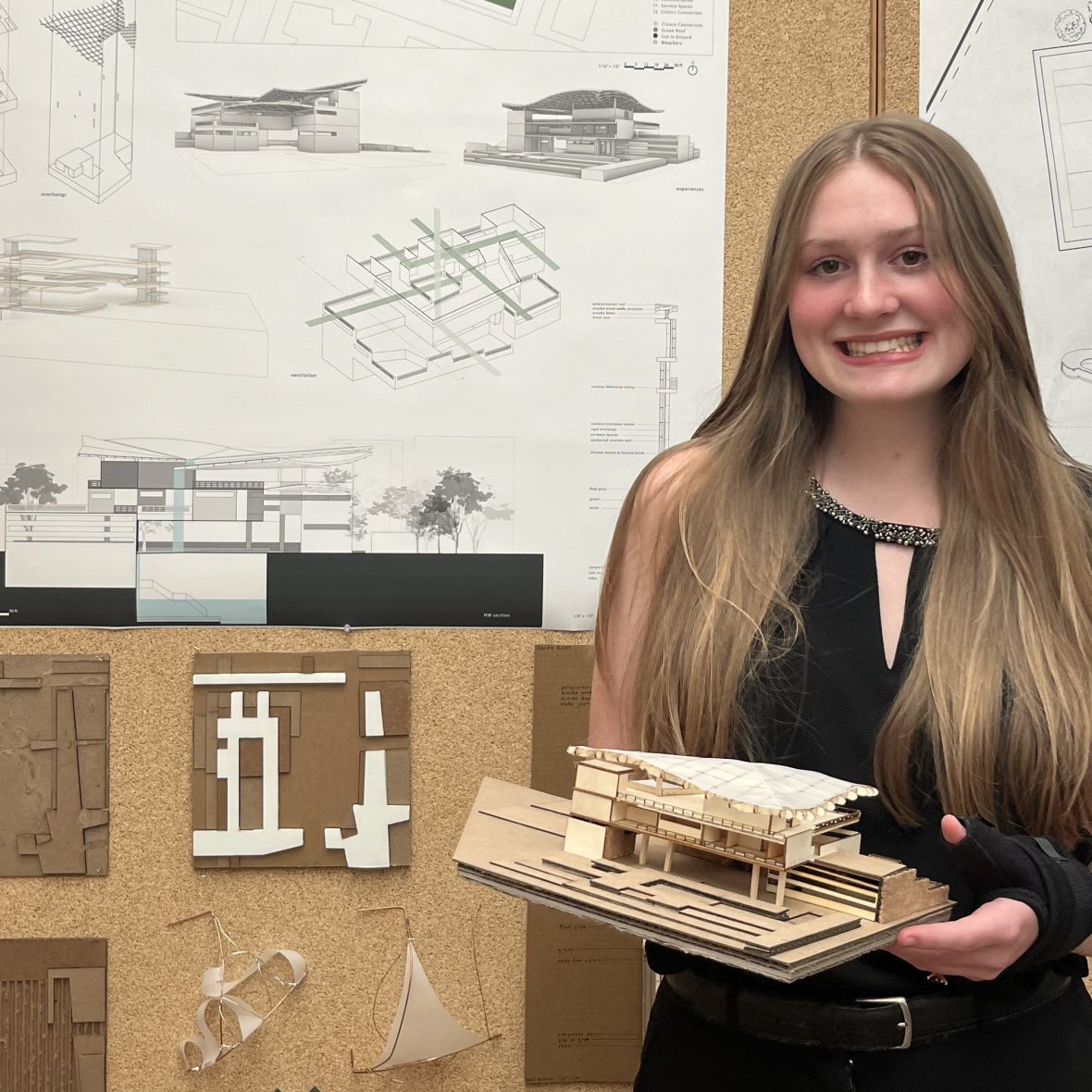 Agnes Rodts holding an architectural model she created