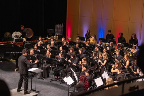 Conductor in front of students in the symphonic band