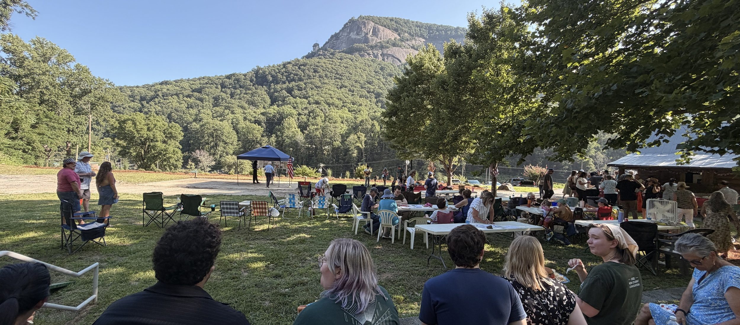 Chimney Rock Village picnic, with mountain in the background