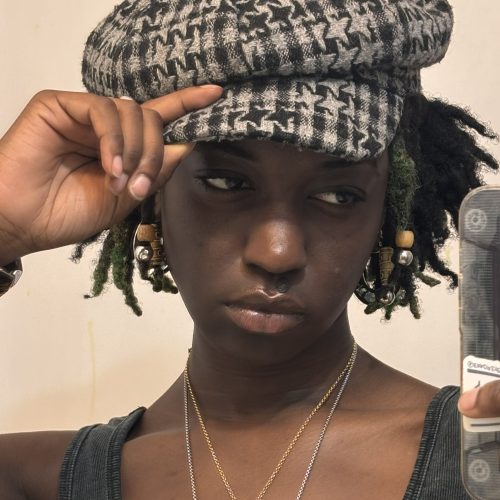 Leilani Jones wearing a hat an taking a selfie
