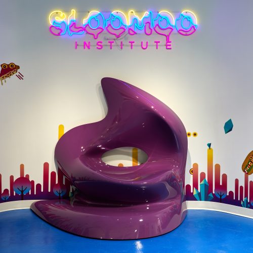 a purple fiberglass "slime" chair