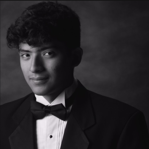 Headshot of Josue Herrera wearing a tuxedo