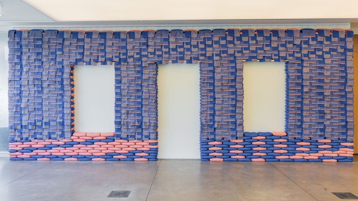 a picture of the textile wall section, "Neighbors to your right and left" installed by Waller and Elberfeld at Washington University in St. Louis.