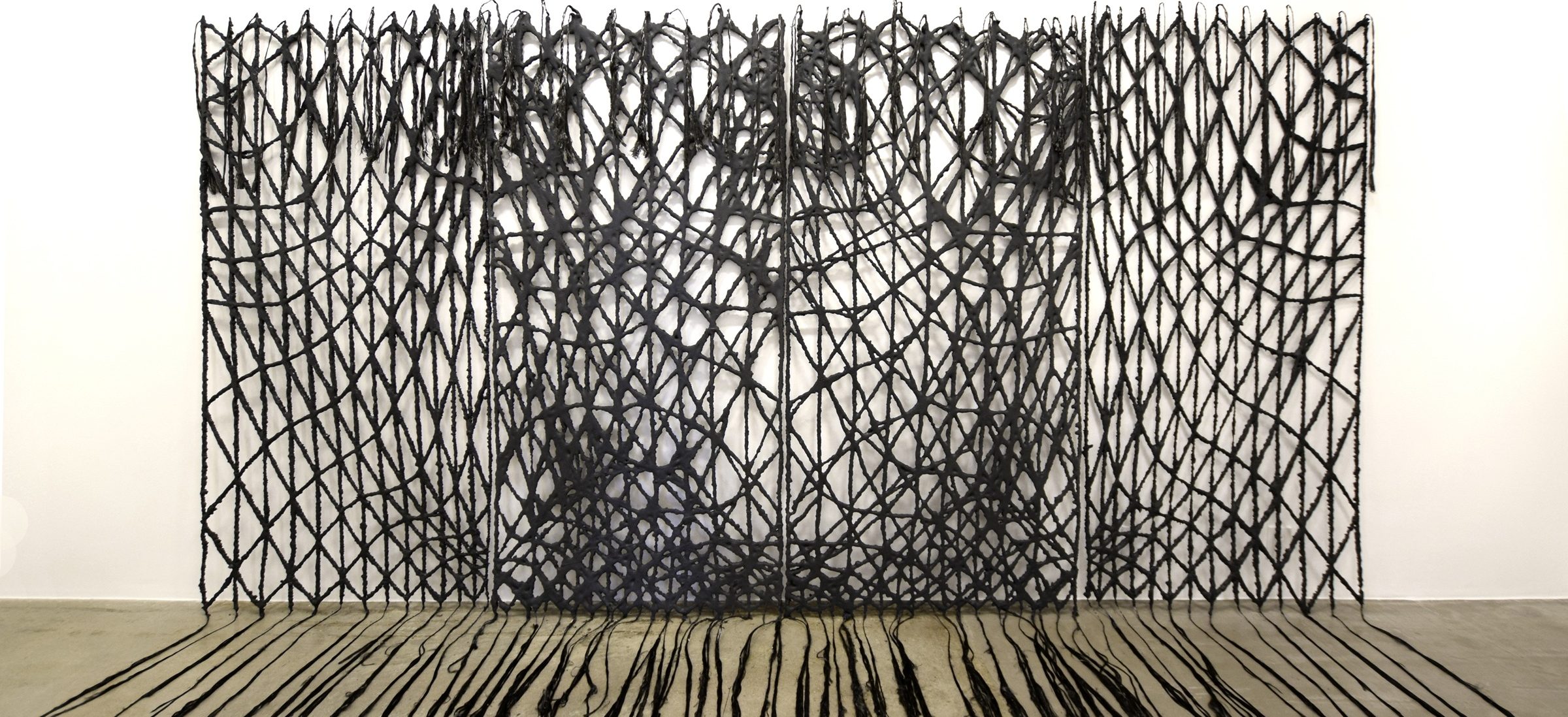 four panels of "Concrete Tapestry" - carbon fiber dipped in concrete