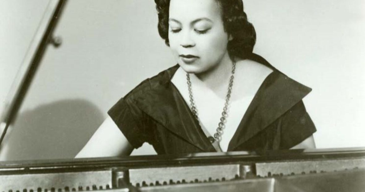 Old black and white photo of Margert Bonds at the piano