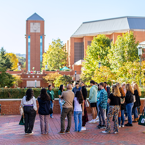 students on a campus tour in our quad by the union