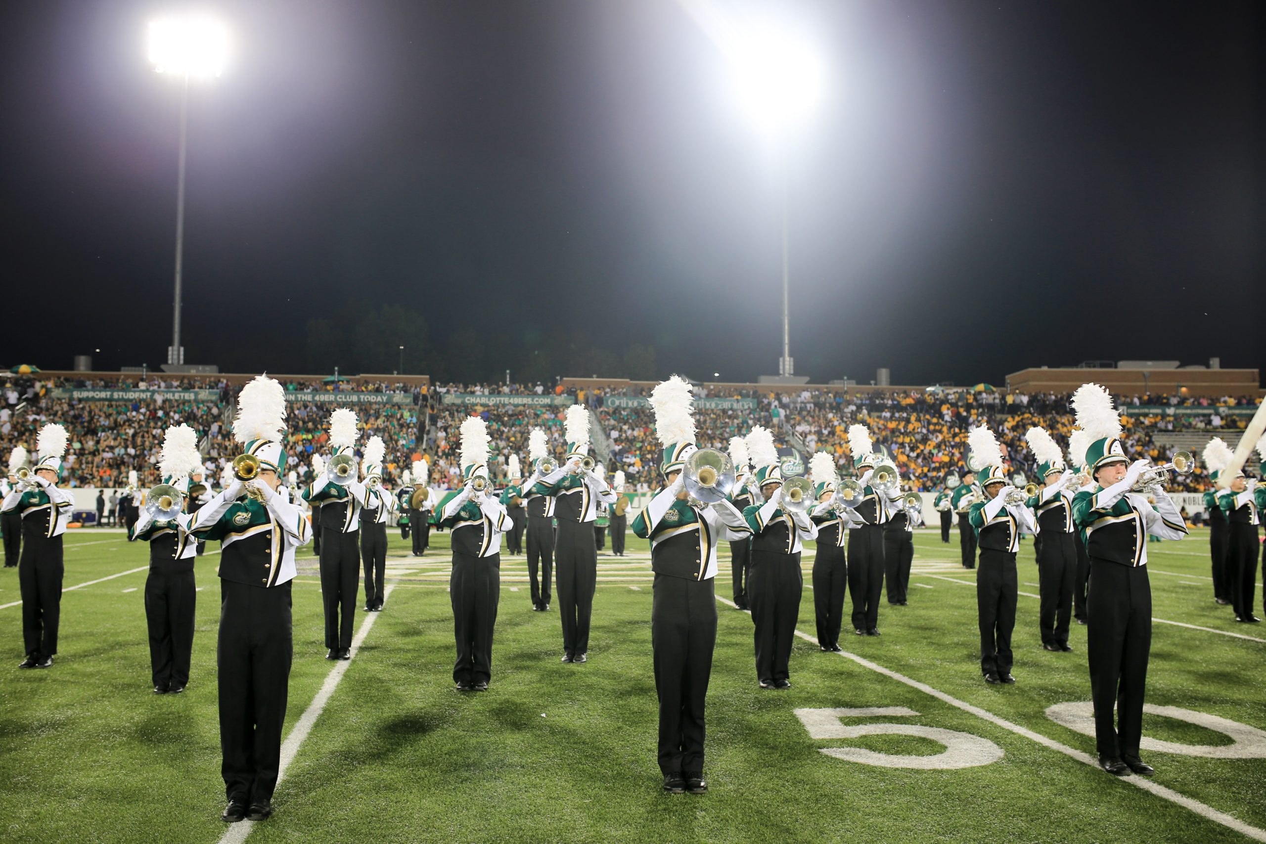 marching band at night performing