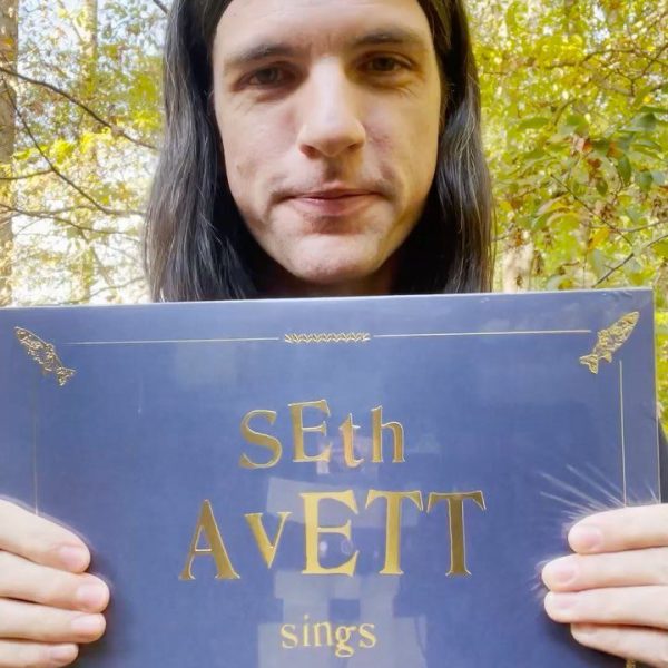 Seth Avett with album cover