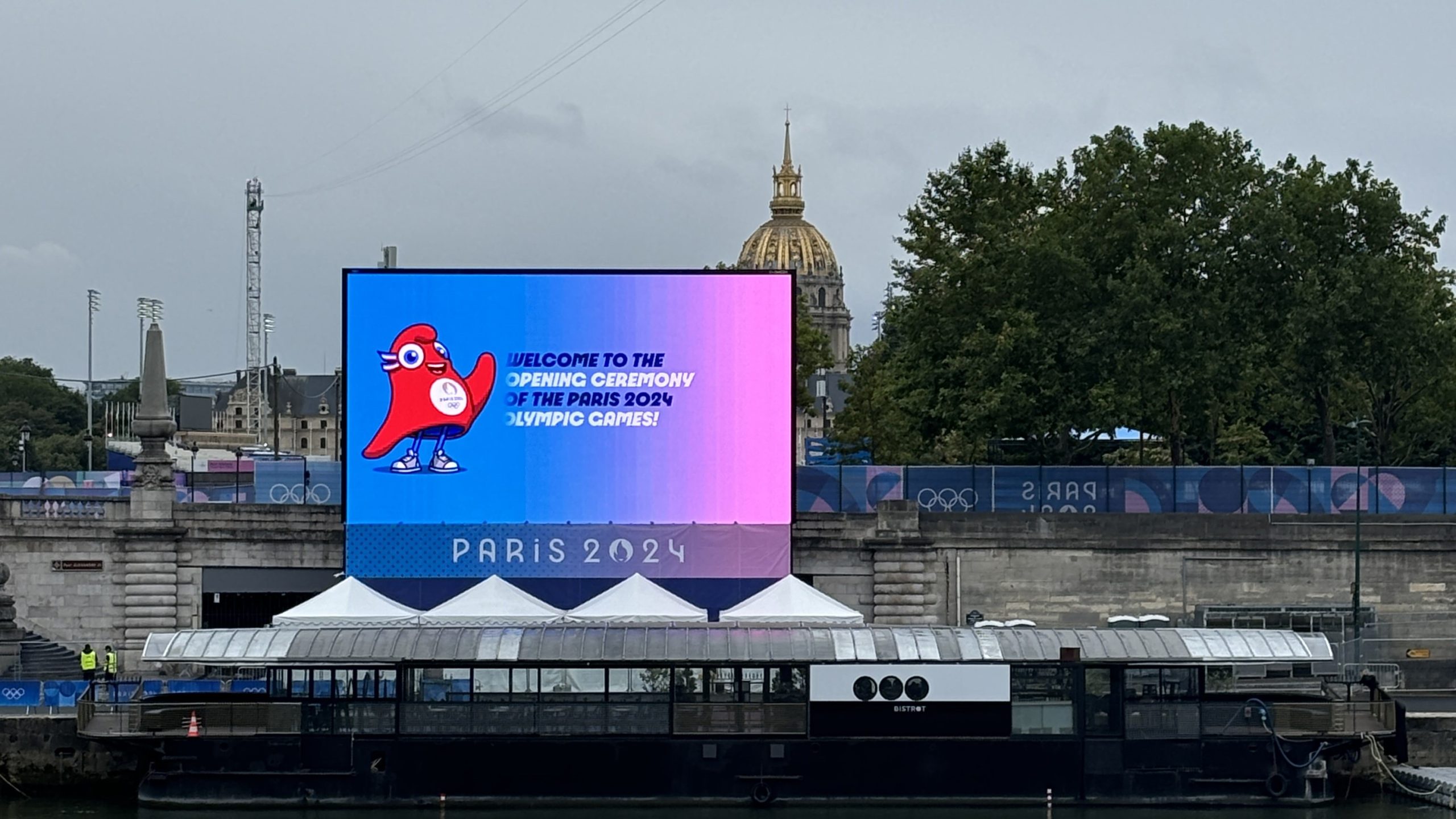 photo of large screen at Paris Olympics ceremony