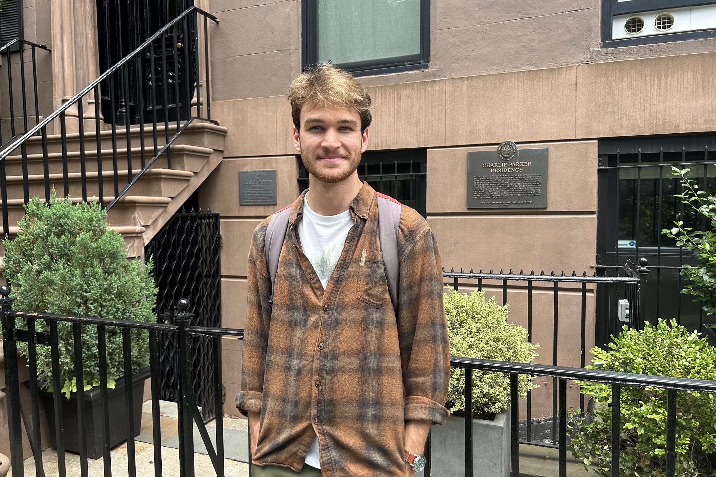 Adam Kallestad in New York City in front of Charlie Parker's house.