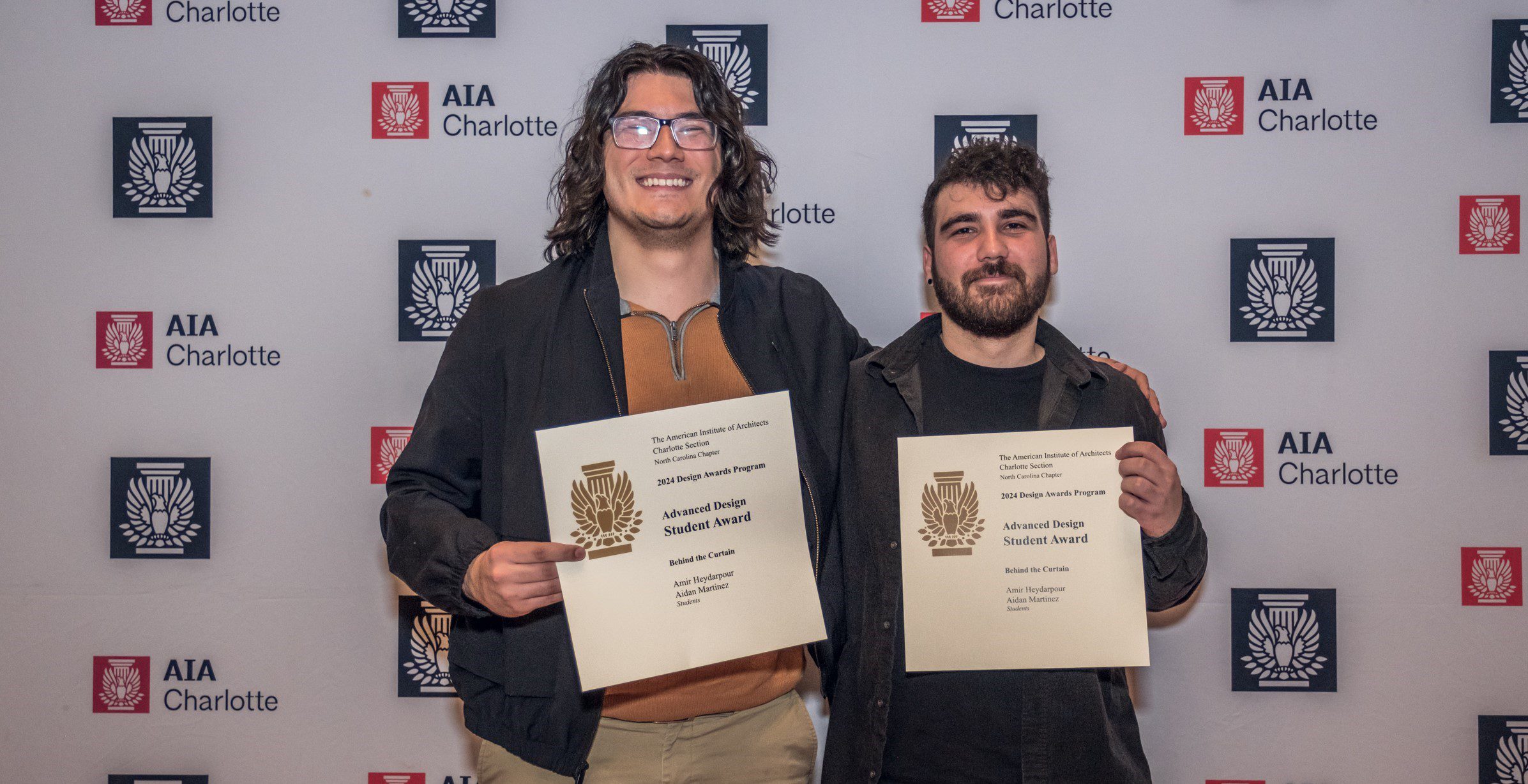 Amir, to the right, and Adrian Martinez, with their certificate awards.