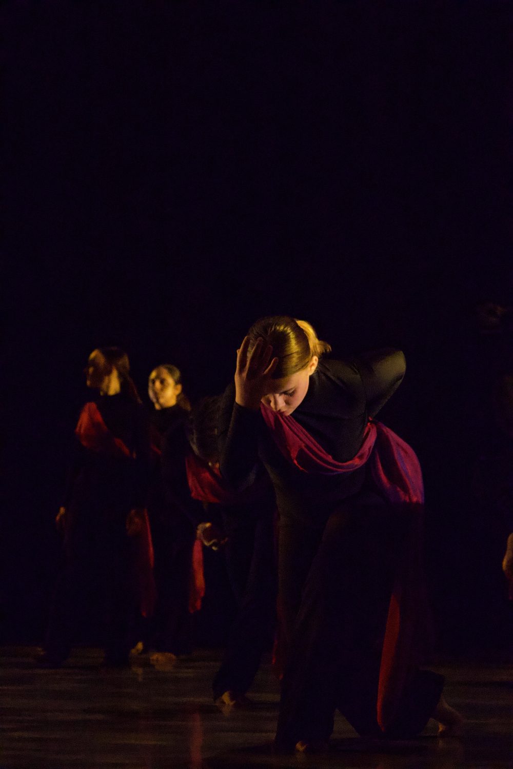 dancers in black and red
