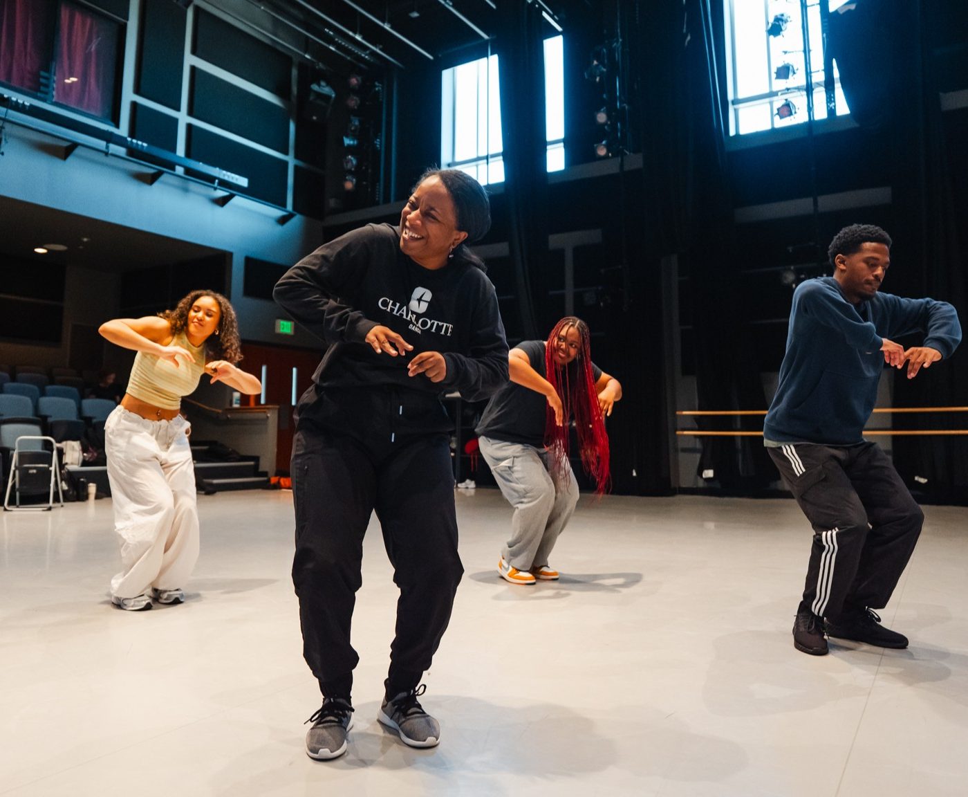 Professor Ashley Tate leads a hip hop class.