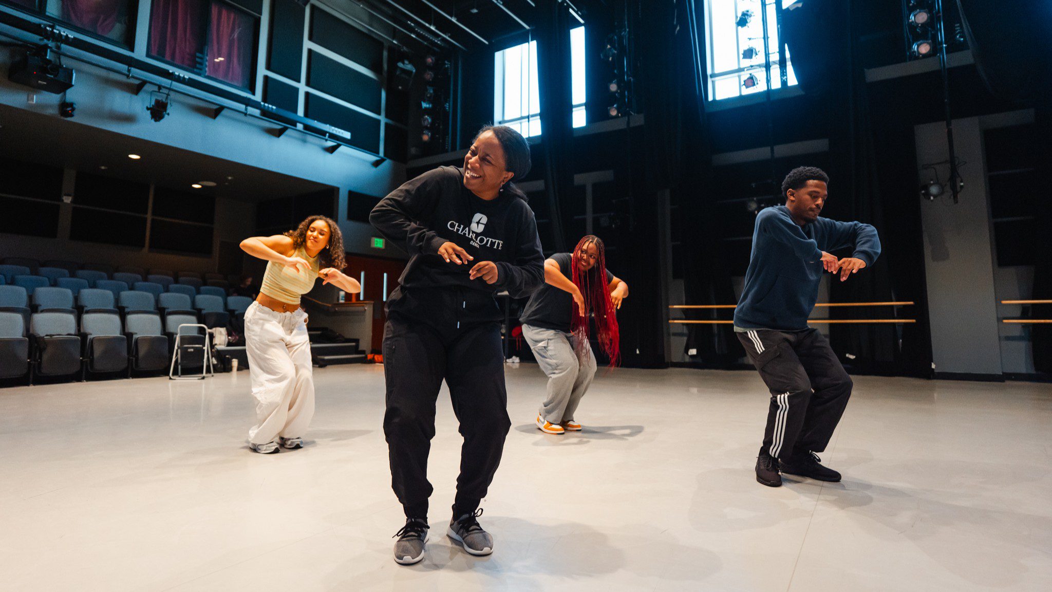 Professor Ashley Tate leads a hip hop class.