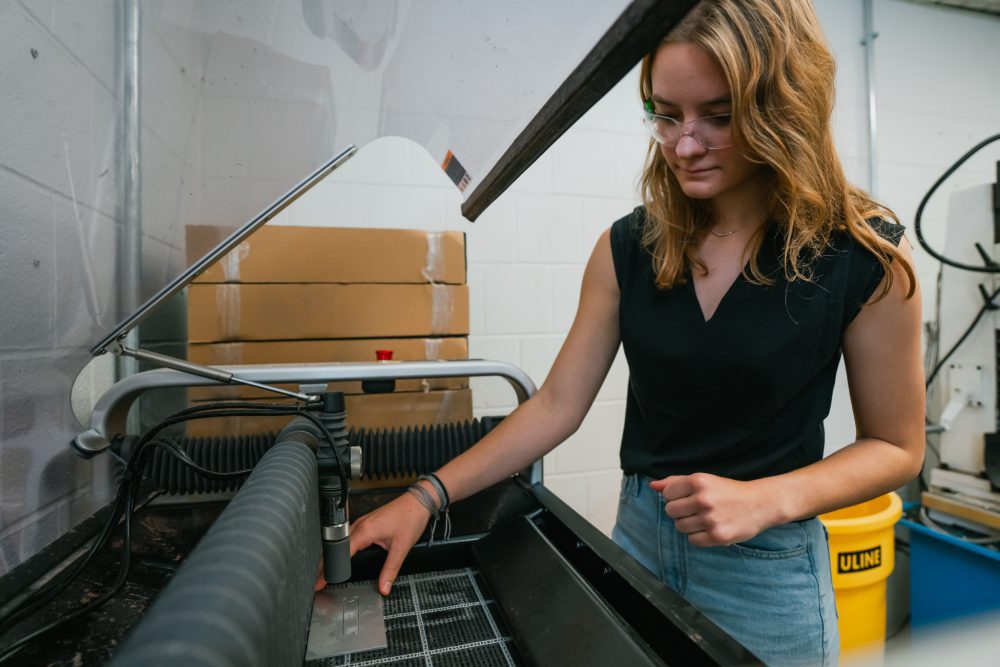 architecture student working in the fab lab