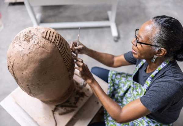 Lydia Thompson working in her studio.