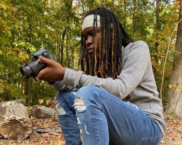 Lorien Arts student with camera