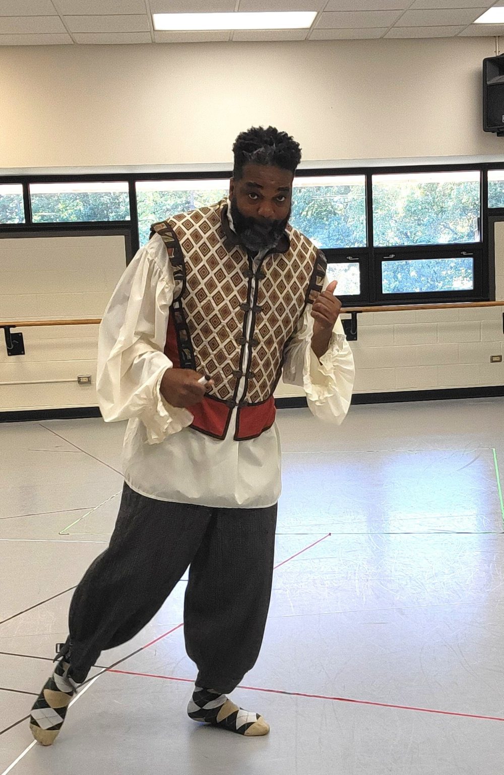 Rory Sheriff in commedia costume in dance studio