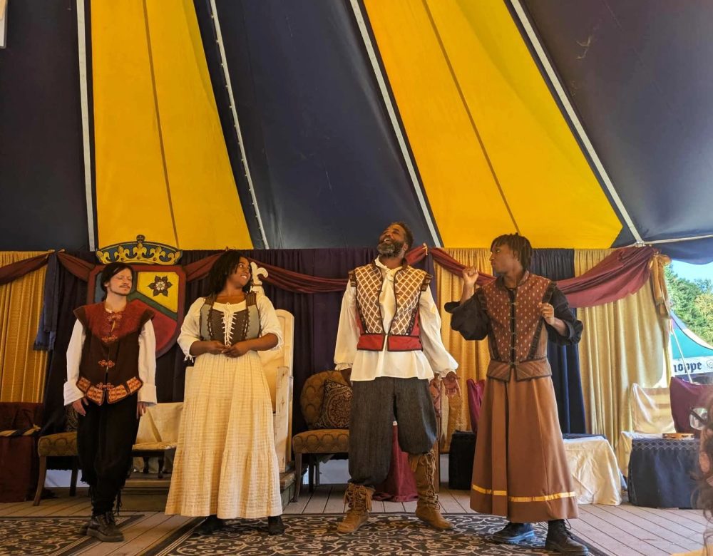 Rory Sheriff and three other theatre students performing at the Renaissance Festival.